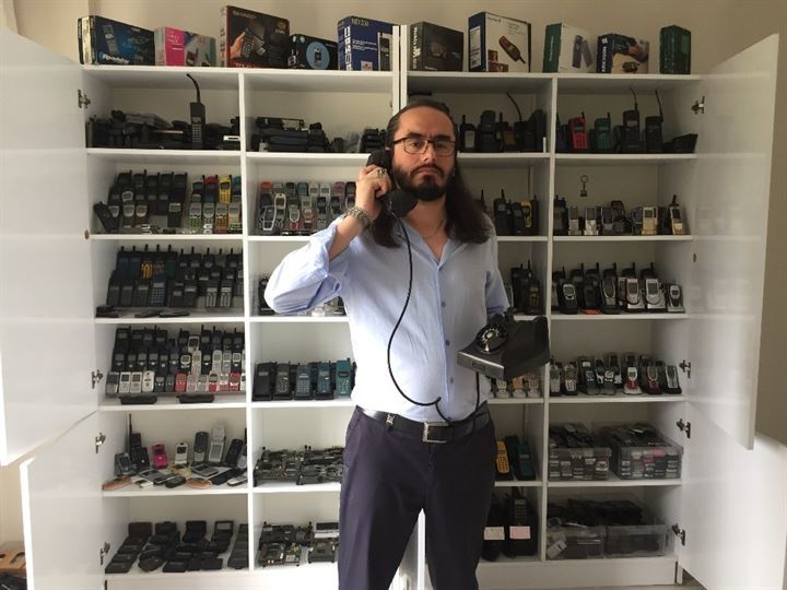 A Turkish mobile phone technician living in Istanbul has collected a total of 2,000 mobile phones in 15 years. Ekrem Karagüdekoğlu, a citizen of Istanbul, said that he sleeps in the same room where he stores the most precious devices of his collection. Alongside vintage models, the collection also includes an exact replica of a phone used in hit "The Matrix Reloaded" movie in 2003. The mobile phone enthusiast has currently put his entire collection up for sale for €2,5 million euros.