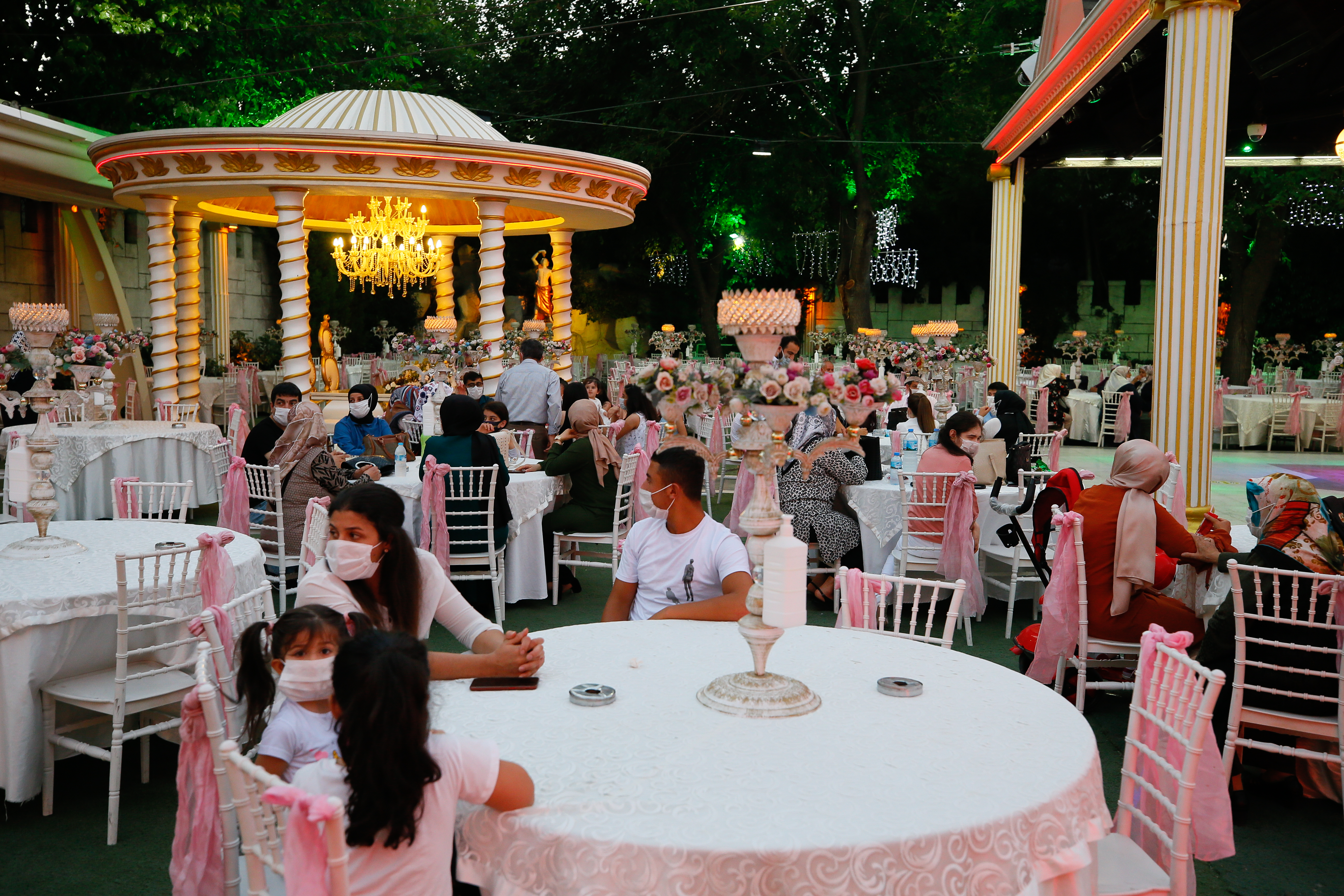You may not kiss the bride! Turkey's wedding halls reopen- but with a twist
