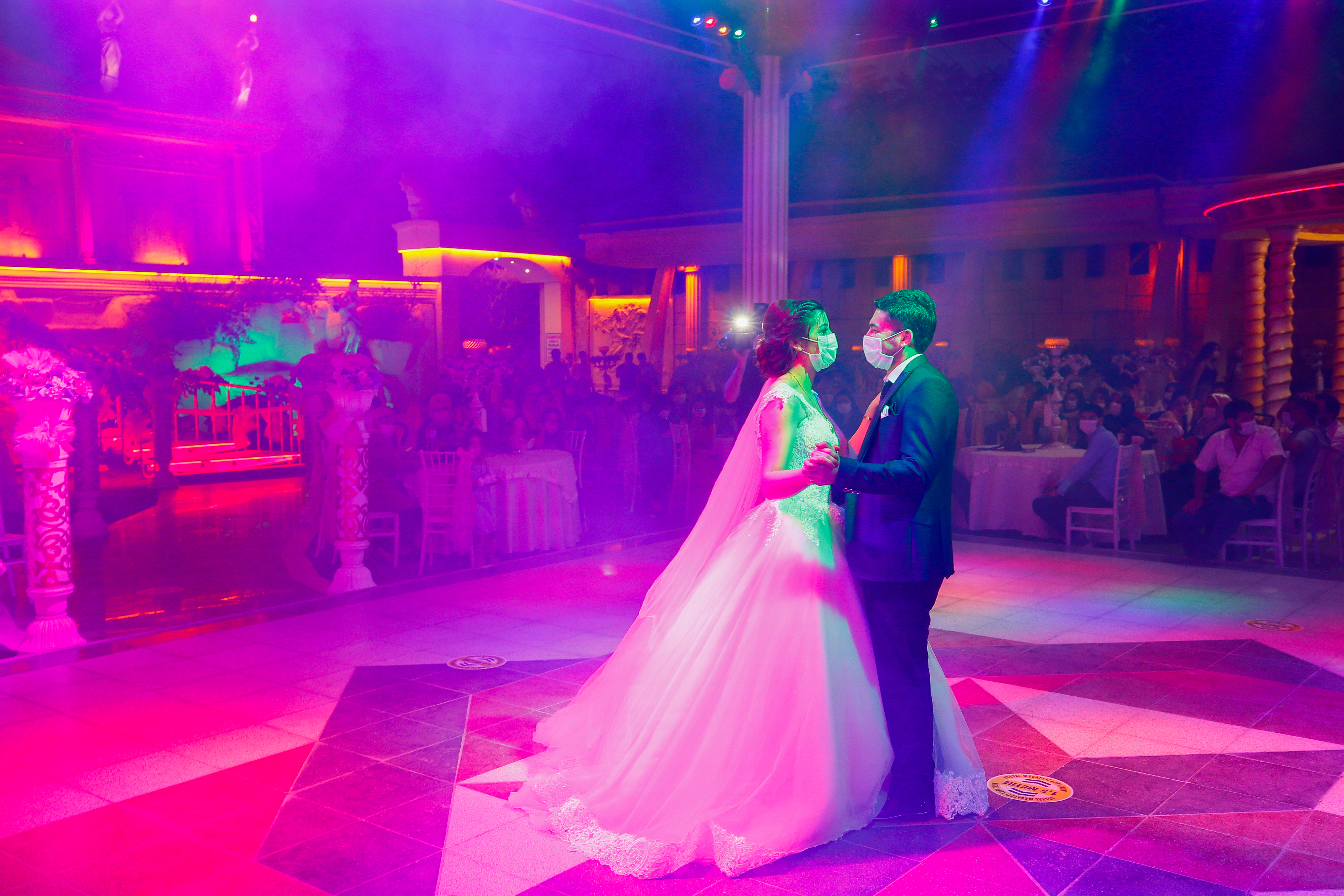 You may not kiss the bride! Turkey's wedding halls reopen- but with a twist