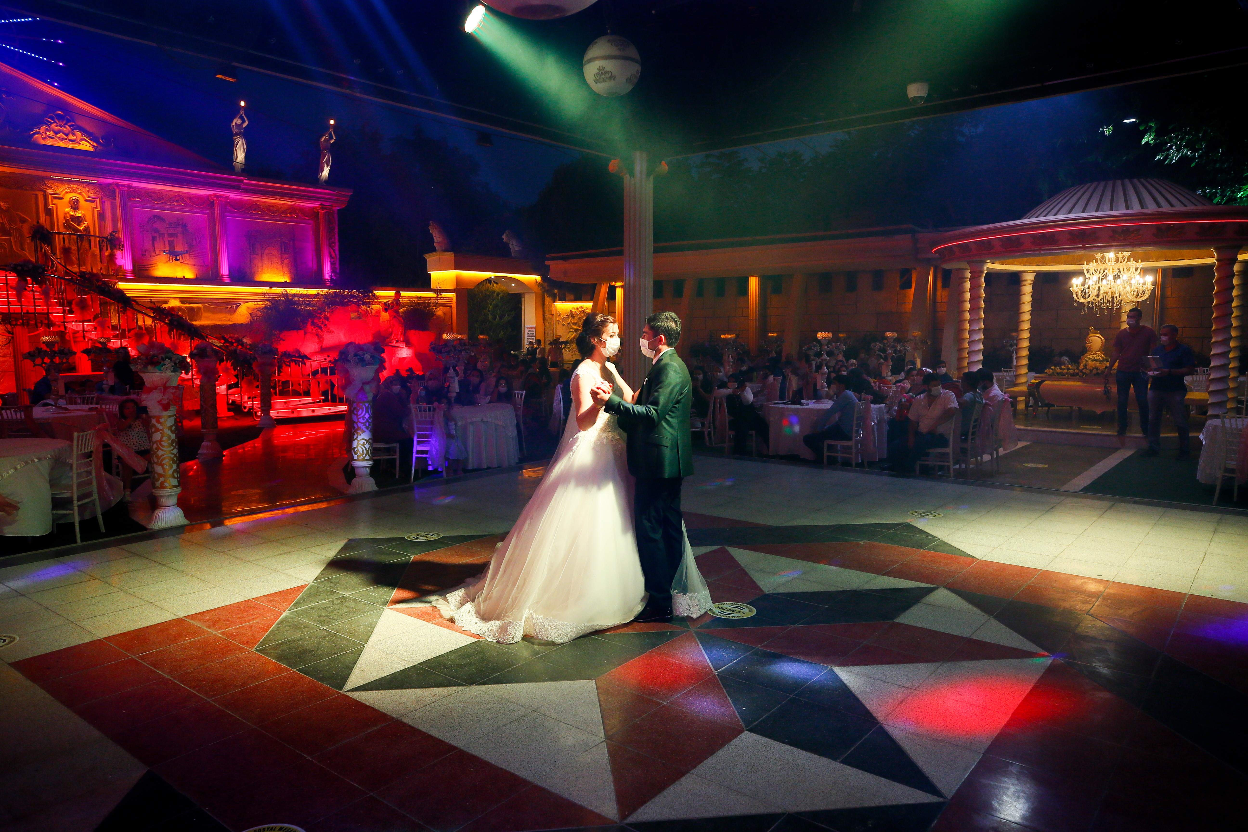 You may not kiss the bride! Turkey's wedding halls reopen- but with a twist