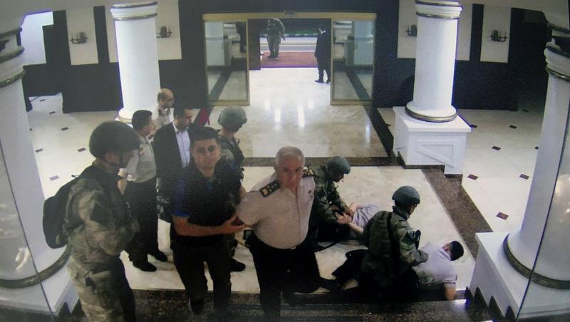 Land Forces Commander Gen. Salih Zeki Çolak was laid on the ground and handcuffed. The same photo also shows the chief of staff of the Land Forces Command, Gen. İhsay Uyar.