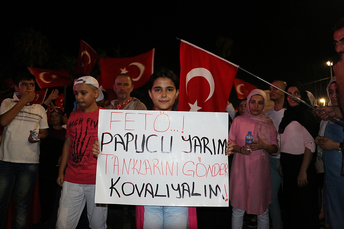 People attending the democracy watch showed their reaction to the coup attempt with the banners they prepared.