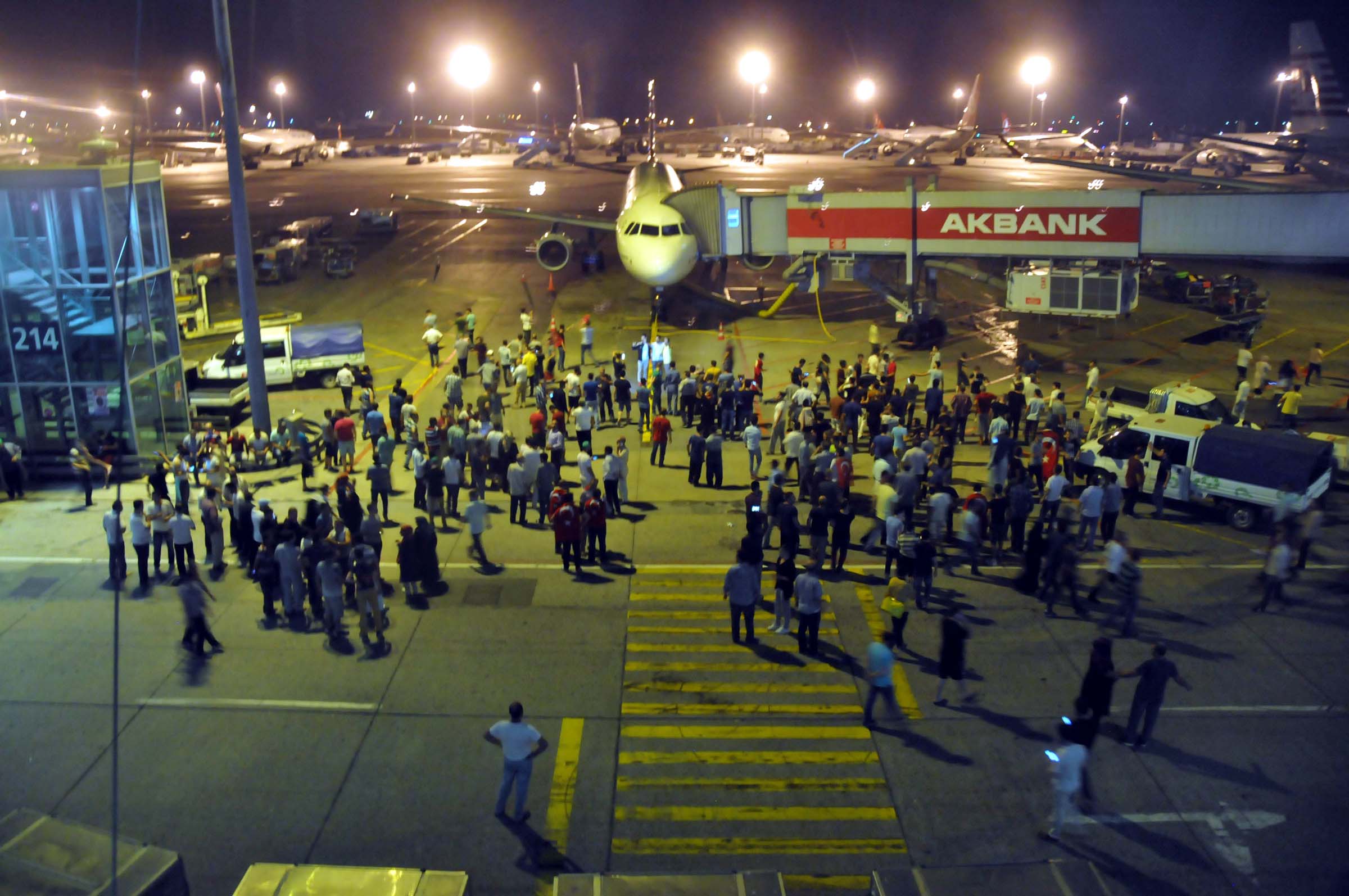 Thousands welcomed the TC-ATA airplane carrying Erdoğan, Energy and Natural Resources Minister Berat Albayrak and their entourage at the airport.