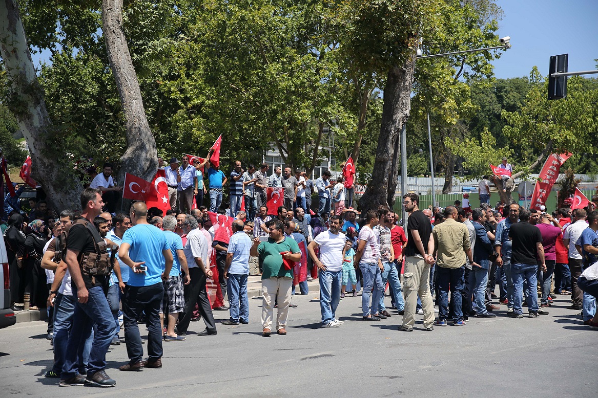 Citizens waiting with Turkish flags.