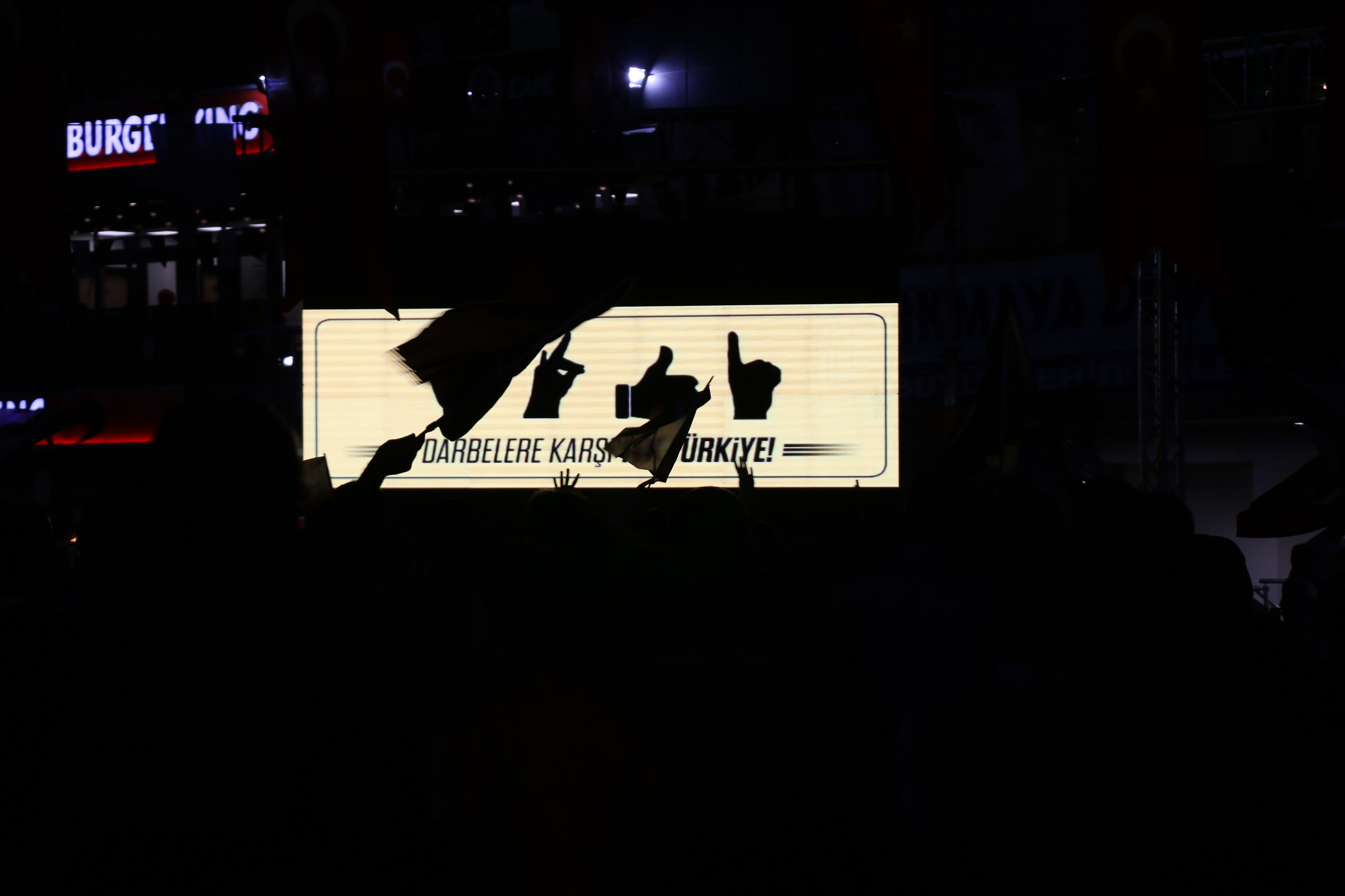 The message of solidarity reflected on screens during the democracy watch period.