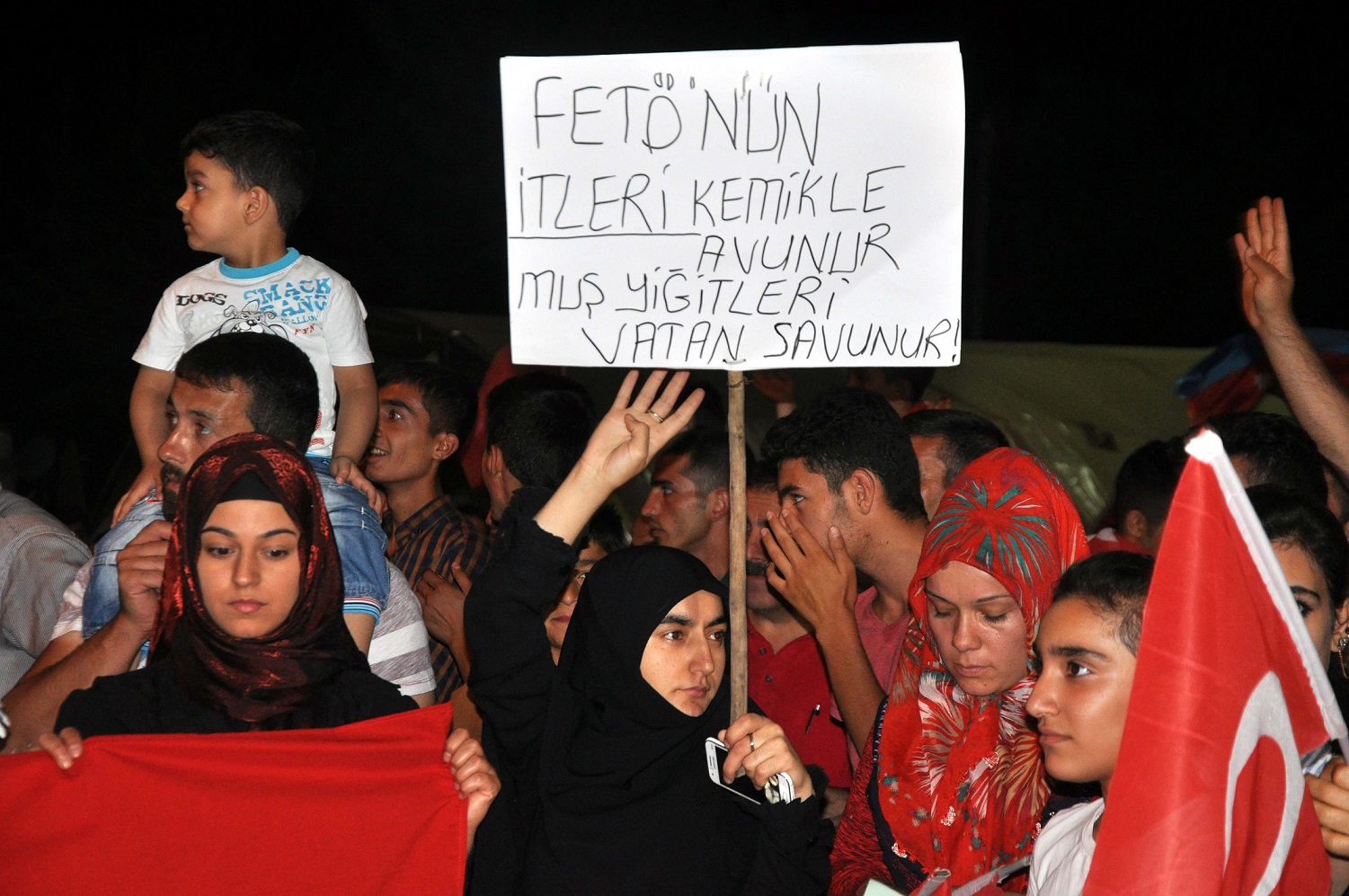 People attending the democracy watch showed their reaction to the coup attempt with the banners they prepared.